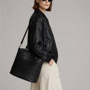 Black and gold bucket bag.